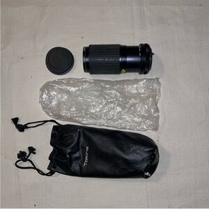 TOKINA Black Zoom Lens with Essential Accessories